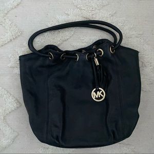 MICHAEL KORS Tassel Drawstring Black Leather Bag